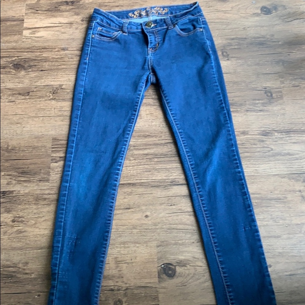 Navy blue wax jeans.